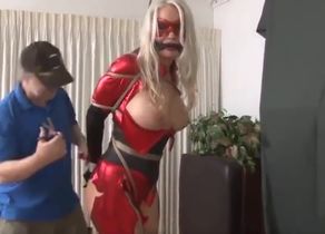 Crimson Superheroine in Restrain bondage