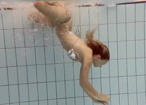 Juggling breasts underwater