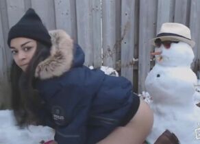 Woman plows a snowman or snowman plows