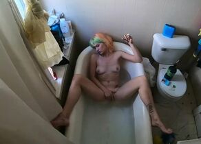 Rainbow Brite takes a bathtub